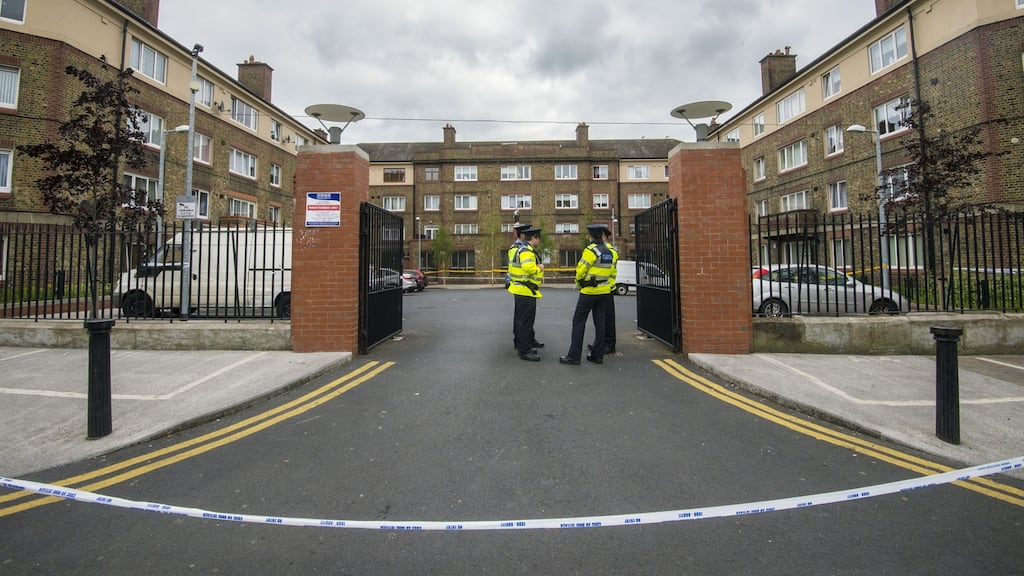 Gardaí outside Avondale House flats on North Cumberland Street, Dublin following the fatal shooting of Gareth Hutch on May 24th, 2016. File photograph: Brenda Fitzsimons/The Irish Times.