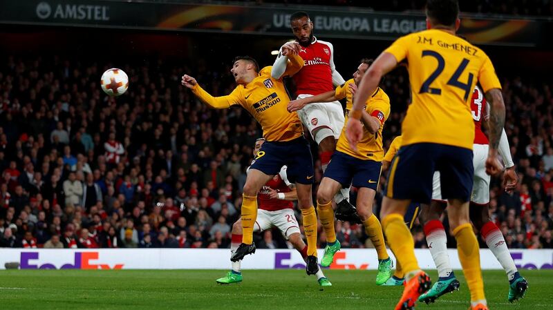 Arsenal striker Alexandre Lacazette heads home his side’s goal in the Europa League semi-final first leg against Atlético Madrid at the Emirates Stadium. Photograph: Eddie Keogh/Reuters