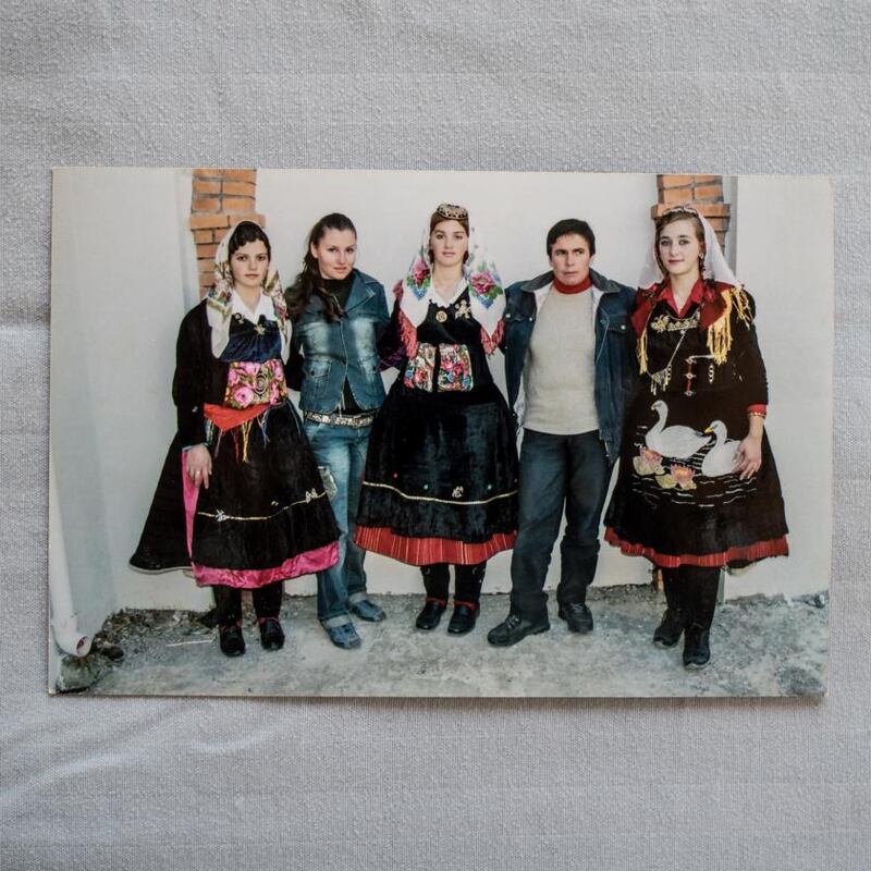 A photo of Gjystina Grishaj, known by her male nickname, Duni, with other women in the Albanian village of Lepushe. Photograph: Laura Boushnak/The New York Times