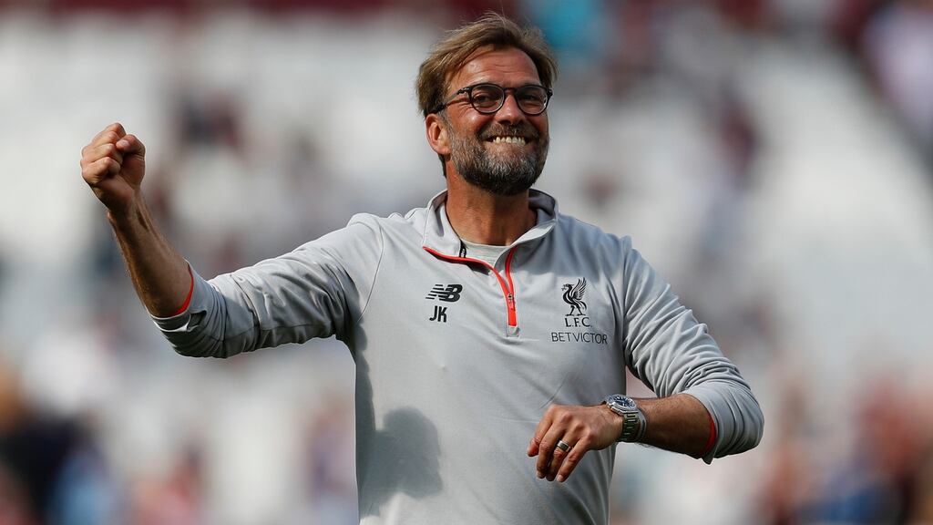 Manager Jürgen Klopp celebrates Liverpool’s victory over West Ham which put Champions League qualification back into their own hands. Photograph: Peter Nicholls/Reuters