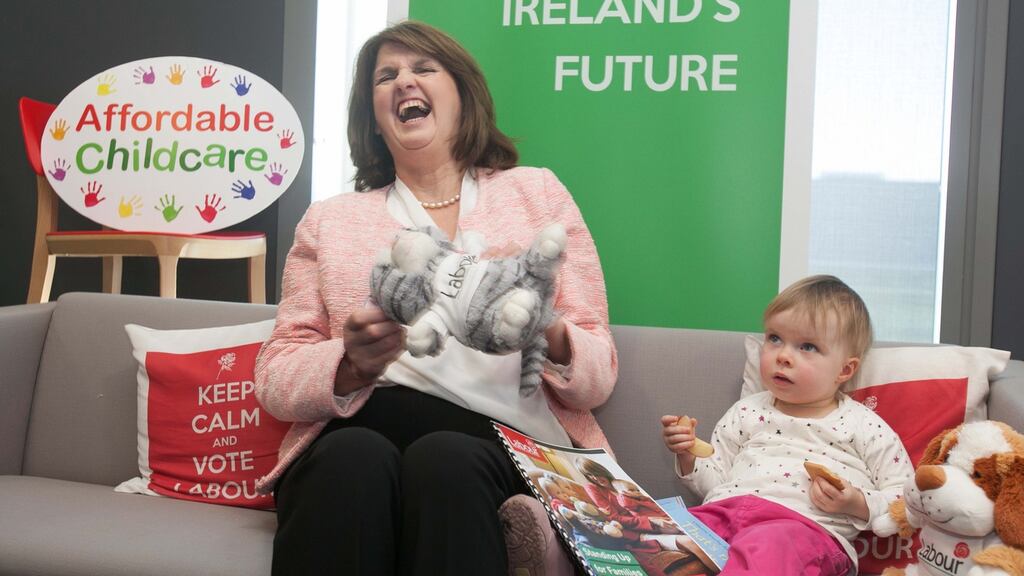 Tánaiste Joan Burton and Abi Boxshall (2), from Lucan, at the launch of Standing Up For Families, Labour’s plan for quality and affordable childcare. Photograph: Gareth Chaney/Collins