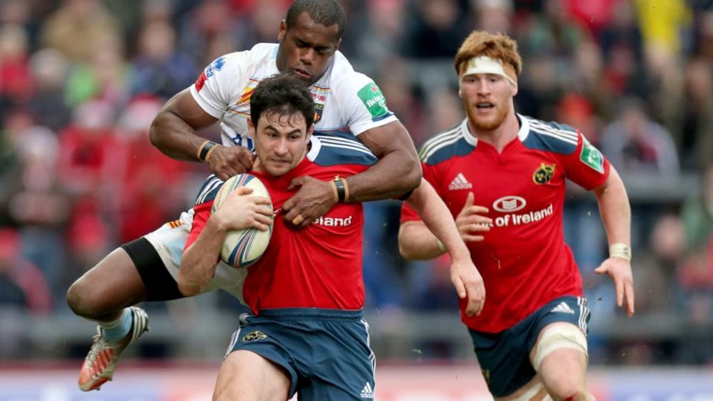 Perpignan’s Watisoni Votu tackles Munster’s Felix Jones in the Pool Six game at Thomond Park. Photograph: James Crombie/Inpho.