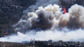 Dozens flee Athens homes as wildfires burn in Greece