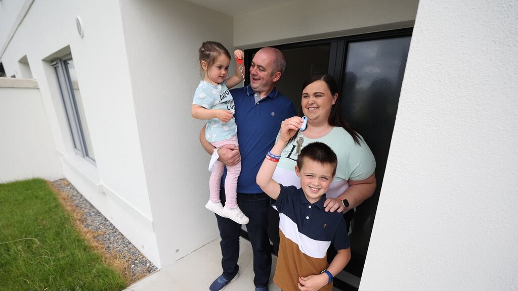 Daryl and Niamh Harney with children Sarah (2) and Jamie (8) at their new home in Baltinglass, Co Wicklow. Photograph: Nick Bradshaw