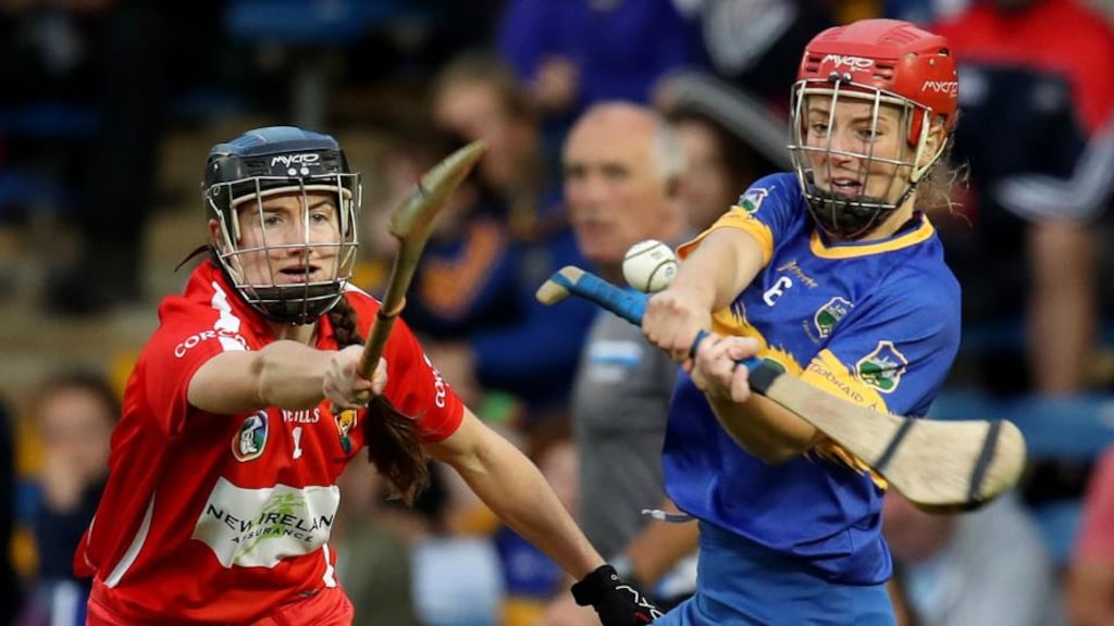 Cork’s Pamela Mackey attempts to block Karen Kennedy of Tipperary during the Liberty Insurance All-Ireland Senior Camogie Championship semi-final at Semple Stadium in Thurles. Photograph: Bryan Keane/Inpho