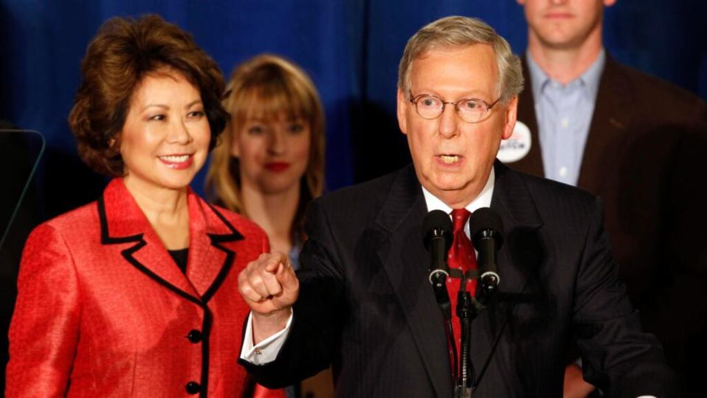 US Senate Republican leader Senator Mitch McConnell and his wife Elaine Chao address a crowd of supporters after defeating Tea Party challenger Matt Bevin in the state Republican primary elections in Louisville, Kentucky. Photograph: John Sommers II/Reuters