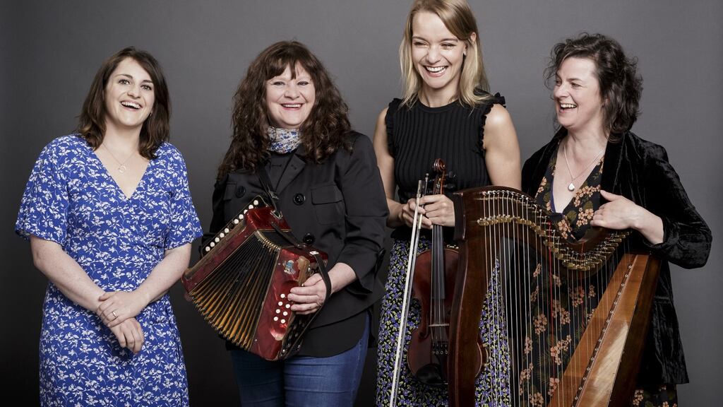 Tara Breen (fiddle), Laoise Kelly (harp), Josephine Marsh (accordion), and Nell Ní Chróinín (voice) are seen before their Music Network tour.