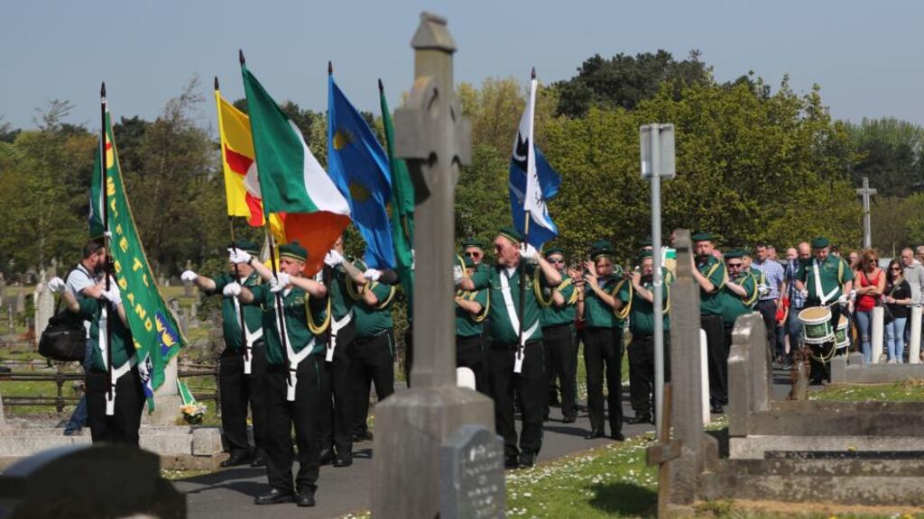Flags are flown during the Saoradh Easter commemoration at Milltown Cemetery in Belfast on Monday. Photograph: Niall Carson/PA Wire