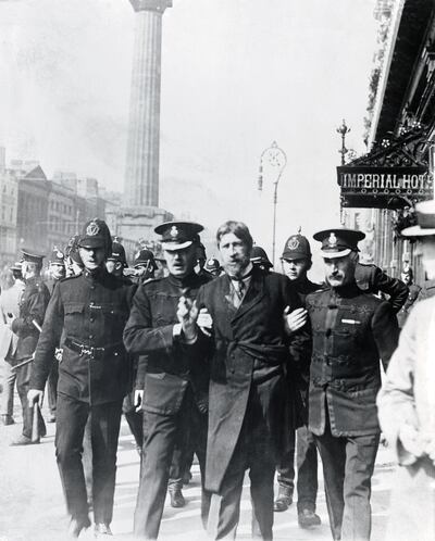 Larkin, complete with fake beard and moustache in order to disguise himself, is arrested outside the Imperial Hotel the day after the match. Photo: Getty Images