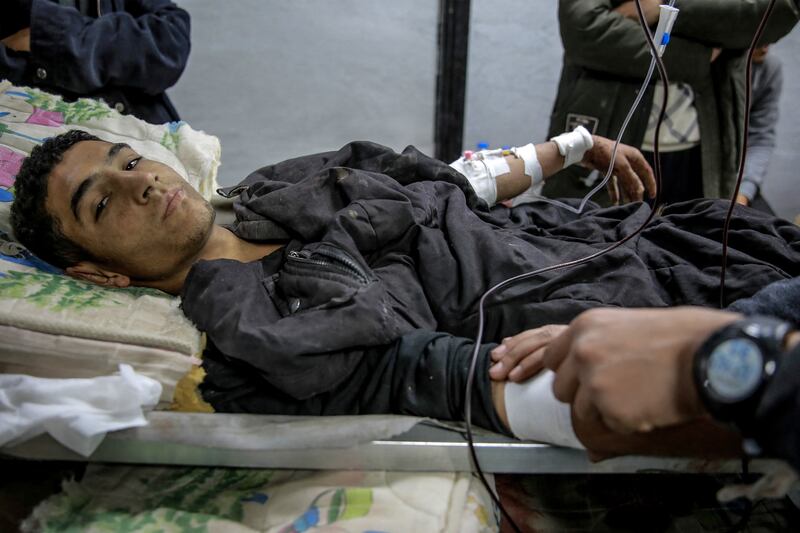 A man receives treatment at Al-Shifa hospital in Gaza City, after dozens of Palestinians were killed when Israeli forces are alleged to have opened fire on crowds rushing at an aid distribution point. Israel said the victims were either crushed in the stampede or run over by aid lorries. Photograph:  AFP via Getty Images