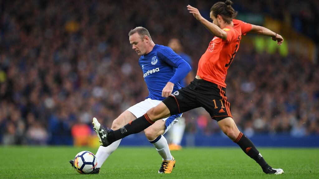 Everton’s Wayne Rooney vies with MFK Ruzomberok’s Matej Kochan during the Europa League third qualifying round match at Goodison Park. Photograph: Getty Images