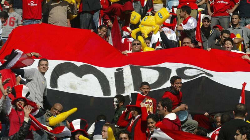 Egyptian fans display a national flag with Mido’s name on it prior to the African Cup of Nations final against Ivory Coast in 2006. Photo: Abdhelhak Senna/Getty Images
