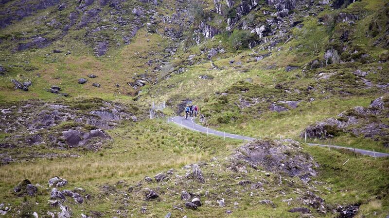 The cycle includes 1,350 metres of climbing over three of Ireland’s highest mountain passes. Photograph: Tadgh Hayes