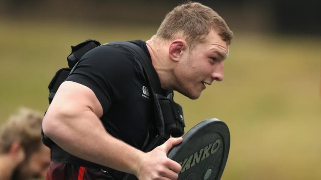 Sam Underhill sprints carrying a weight during an England training session held at Pennyhill Park. Photograph: David Rogers/Getty Images