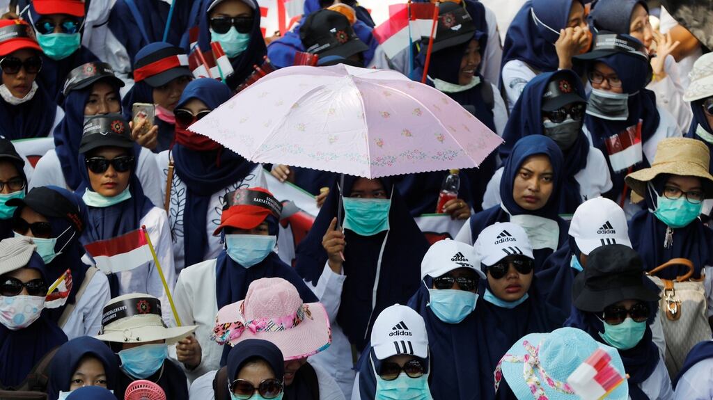 Image of the week: May Day in Jakarta. Jakarta was one of the cities around the world to mark May 1st with a protest for workers’ rights. Photograph: Darren Whiteside/Reuters.
