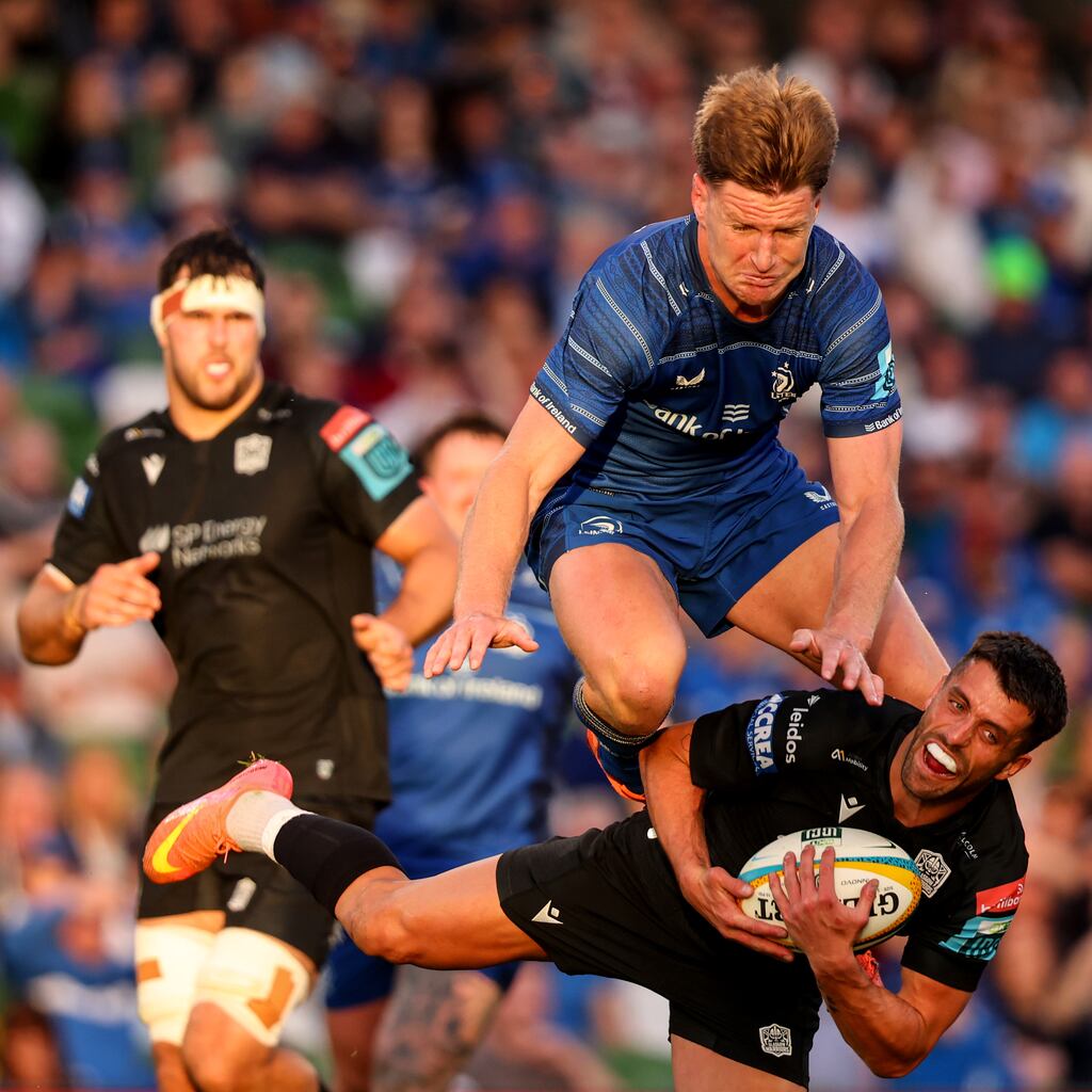 Leinster's Jordie Barrett competes in the air with Adam Hastings of Glasgow Warriors during the BKT United Rugby Championship match at the Aviva Stadium. Photograph: Ben Brady/Inpho
