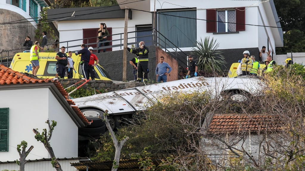 Emergency services at the scene of a tourist bus crash in Canico, Santa Cruz, Madeira Island, Portugal, on Wednesday. Photograph: Homem Gouveia/EPA