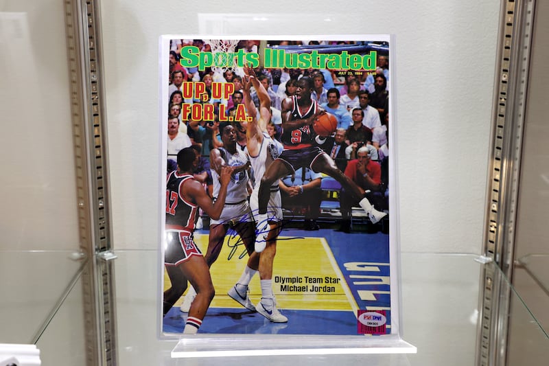 A Michael Jordan signed Sports Illustrated cover on display during a press preview of The Olympic Collection at Sotheby's in New York City on July 21st, 2021. Photograph: Cindy Ord/Getty Images