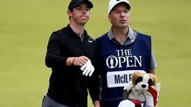 Who has Rory McIlroy lined up as his next bagman?