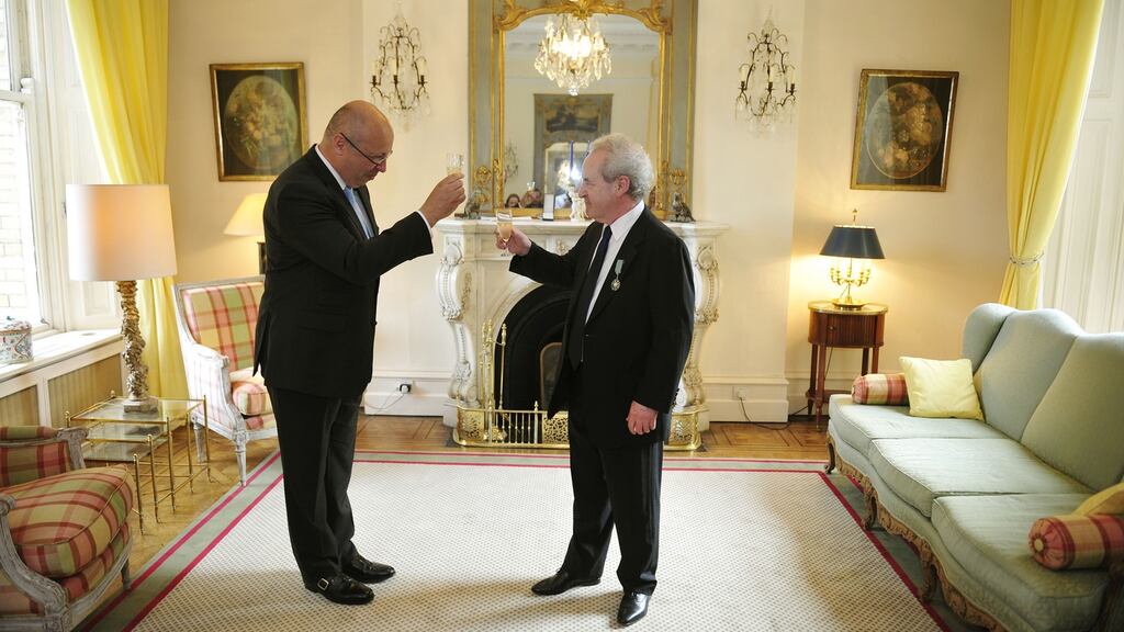 French ambassador Jean-Pierre Thébault (left) toasts John Banville after he was named as a Knight in the Ordre des Arts et Lettres at a reception in the French embassy in Dublin. Photograph: Aidan Crawley