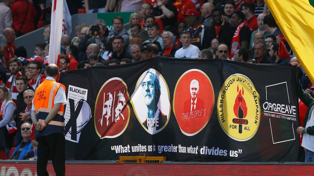 Liverpool fans hold up a banner with Labour Party leader Jeremy Corbyn before the game against Southampton. Photograph:  Phil Noble/Reuters