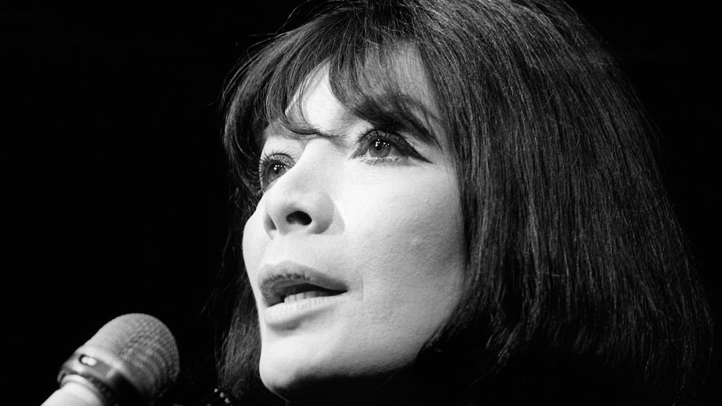 French singer and actor Juliette Greco performs in Paris, in 1968. She was the muse of Saint-Germain-des-Prés, the link between often impenetrable intellectuals and popular song. Photograph: AFP via Getty Images