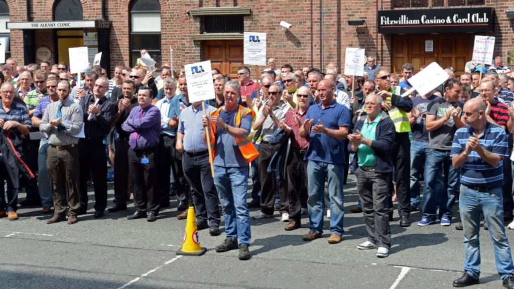 ESB workers aboprotesting about their pensions outside the ESB headquarters in Dublin yesterday. Photograph: Eric Luke