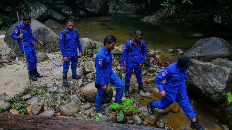 Malaysia Civil Defence Force officers participate in a search and rescue operation for 15-year-old Nóra Quoirin in Seremban, Negeri Sembilan, Malaysia, August 11th 2019. Photograph: Fazry Izmail/EPA