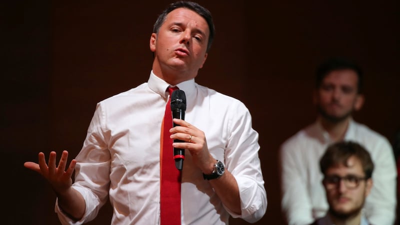 Italy’s prime minister Matteo Renzi talks during a meeting in support of the “Yes” vote. Photograph: Alessandro Bianchi/Reuters