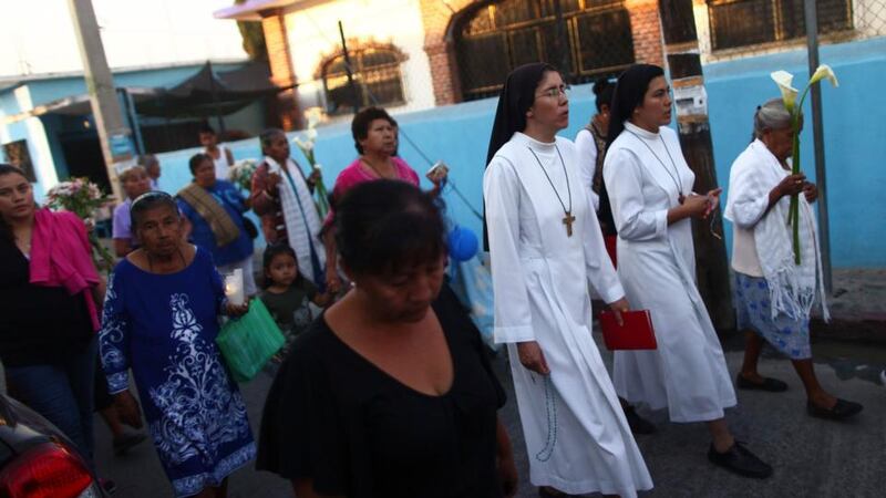 Nuns, friends and neighbours of inmate Edgar Tamayo walk during a procession, praying for him in Miacatlan, Morelos state yesterday. Photograph: Edgard Garrido/Reuters