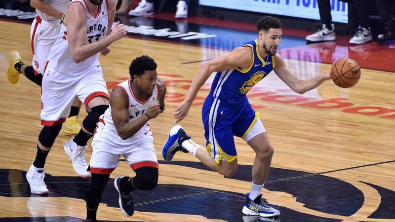 Golden State Warriors guard Klay Thompson drives forward against the Toronto Raptors. Photograph: Warren Toda/EPA