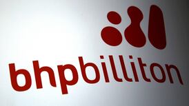 Global miner BHP Billiton slumps to record loss