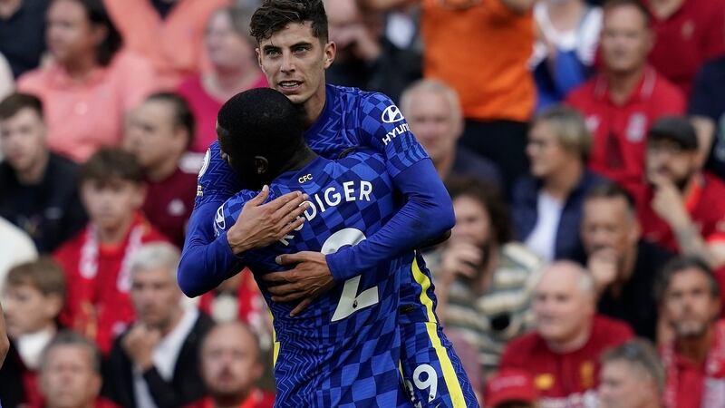 Chelsea’s Kai Havertz celebrates with team-mate Antonio Rüdiger after opening the scoring at Anfield. Photograph: Andrew Yates/EPA