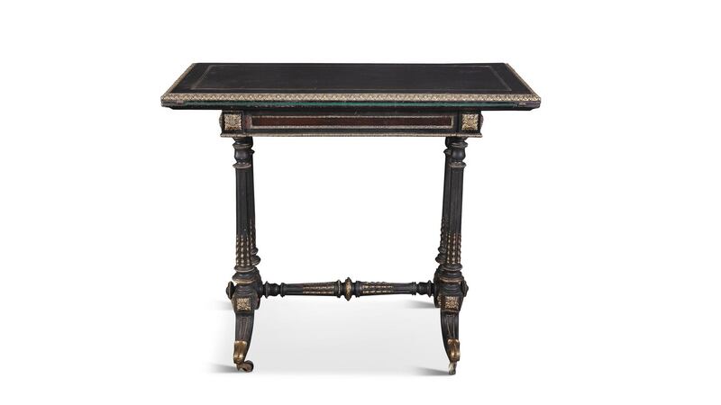 Lot 337: an ebony Louis Philippe folding-top card table with ormolu banding (€800-€1,200).