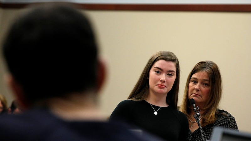 Emma Ann Miller speaks along side her mother Leslie Miller ( at the sentencing hearing for Larry Nassar, (left), a former team US gmnastics team doctor. Photograph: Brendan McDermid/Reuters