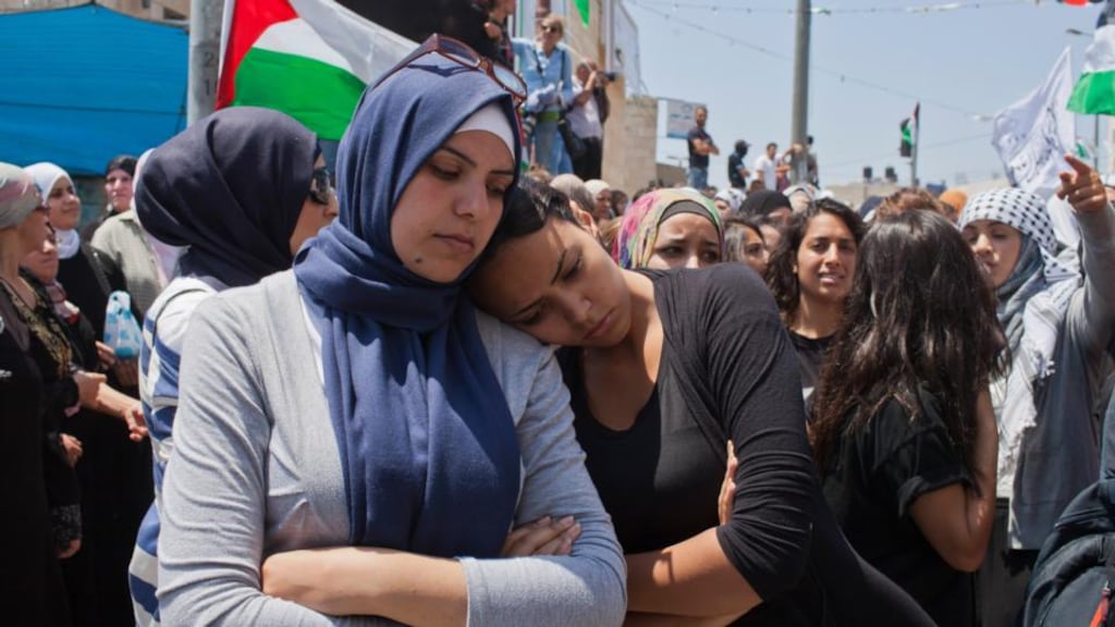 Palestinians mourn for Palestinian teenager Muhammad Hussein Abu Khdeir, outside his home in Jerusale last week. Photograph: Rina Castelnuovo/The New York Times