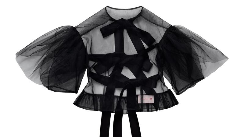 Sheer black top, €49.99.