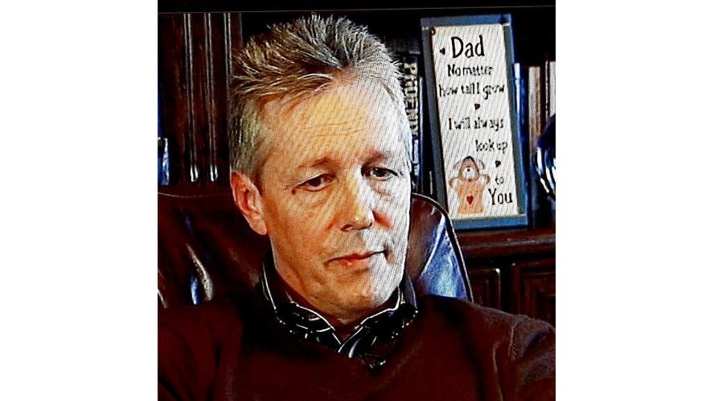 An RTÉ screen grab of Northern Ireland First Minister Peter Robinson speaking to the media from his home in east Belfast yesterday