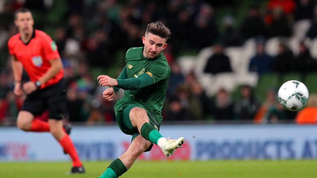 Sean Maguire scores his first goal for Ireland. Photograph: Ryan Byrne/Inpho