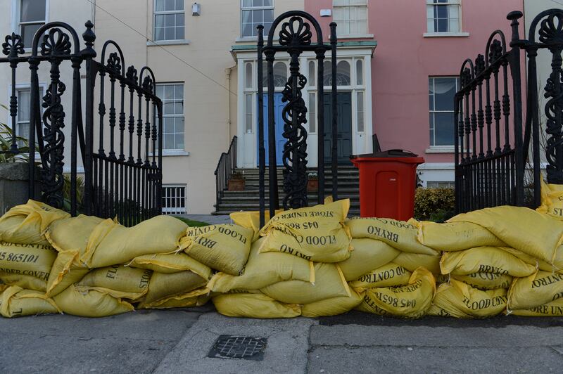Sandbags at the front of homes in Sandymount, Dublin, to protect against flooding in January 2014. Photograph: Cyril Byrne