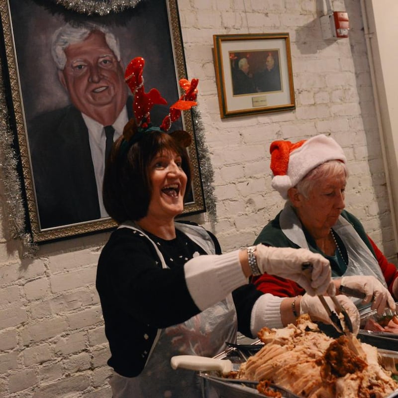 Volunteers serve lunch at the New York Irish Center. Photograph: Lauren Crothers