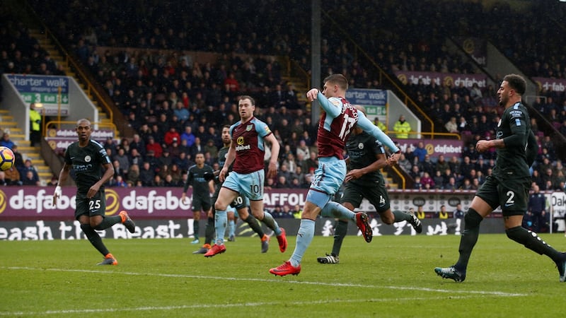 Johann Berg Gudmundsson scores Burnley’s equaliser in the premier league game against Manchester City at Turf Moor. Photograph: Andrew Yates/Reuters