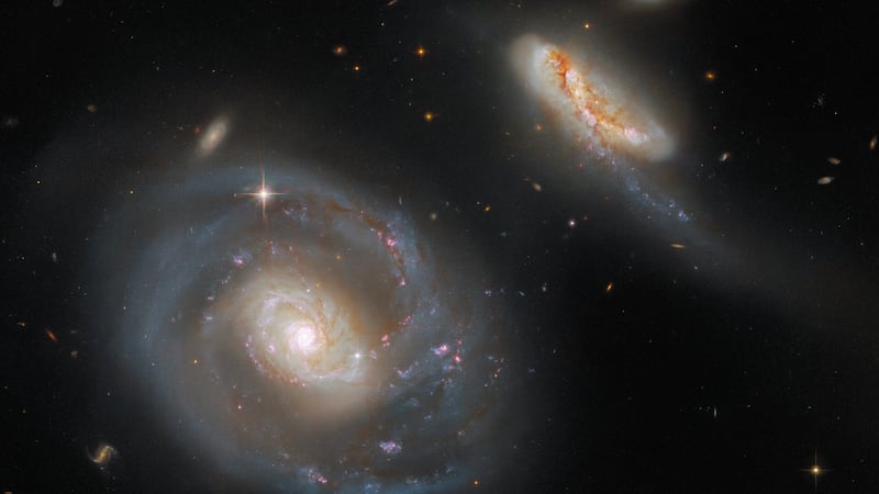 An image from the Hubble space telescope shows a pair of interacting galaxies about 200 million light years from Earth in the Pegasus constellation. This system will be one of the first galaxies observed with the James Webb Space Telescope during summer 2022