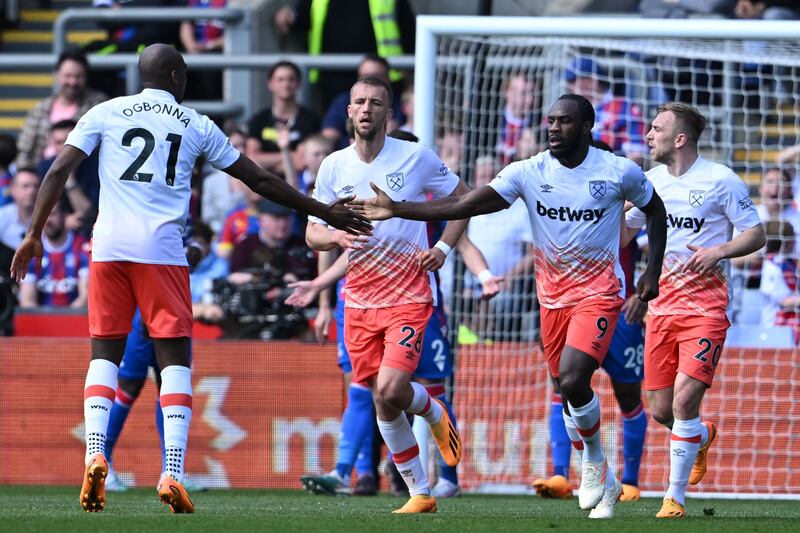 Antonio celebrates with teammates after scoring his side's second goal of the match. Photograph: Justin Tallis/AFP via Getty Images)