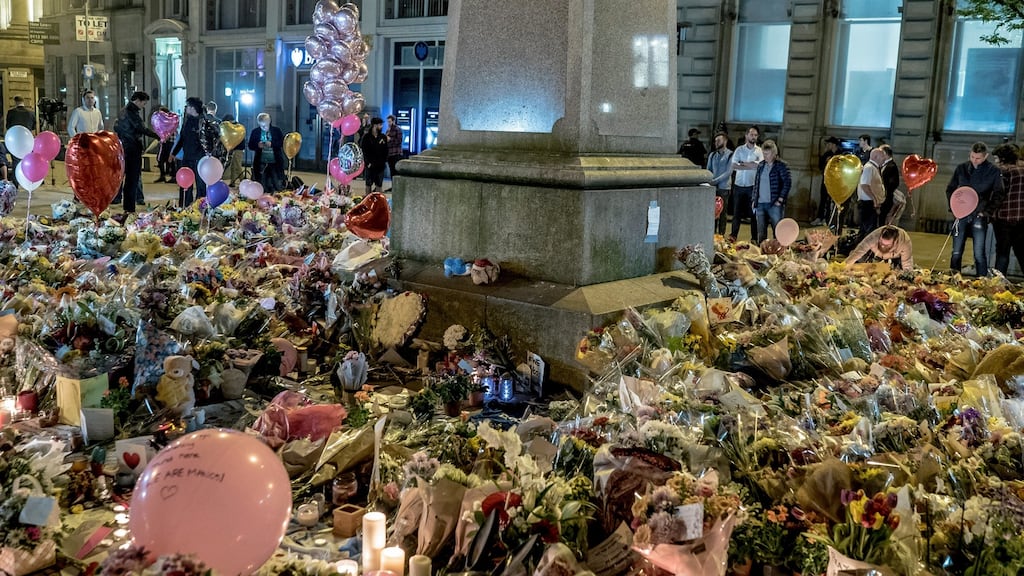 A vigil to the victims of the Manchester Arena bombing, at the nearby St Ann’s Square in Manchester on Wednesday. Photograph: New York Times