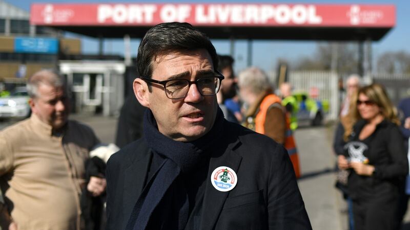 Mayor of Greater Manchester Andy Burnham wears a sticker in support of seafarers outside the entrance to the Port of Liverpool on March 18th last after P&O made 800 crew members redundant without union consultation. Photograph: Anthony Devlin/Getty