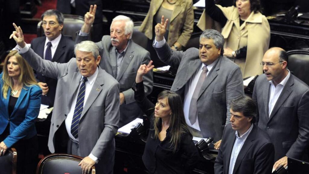 Members of Argentina’s chamber of deputies begin a debate over a bill to locally pay the bondholders who can not collect in the United States due a judge in New York on behalf of investment funds that are suing the South American country. Photograph: Fernando Sturla/EPA