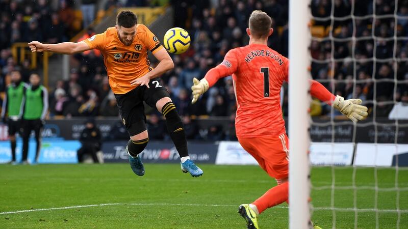 Matt Doherty heads home  Wolves’ equaliser during the Premier League match against Sheffield United at Molineux. Photograph: Shaun Botterill/Getty Images