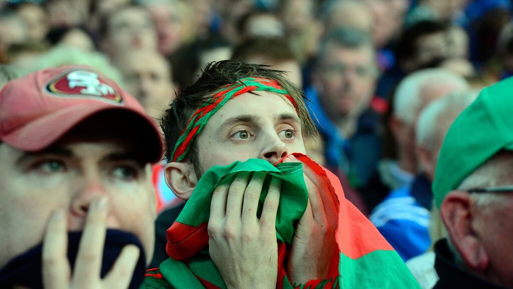Mayo fans show their tension near the end of the replayed All-Ireland final at Croke Park. Photograph: Cyril Byrne
