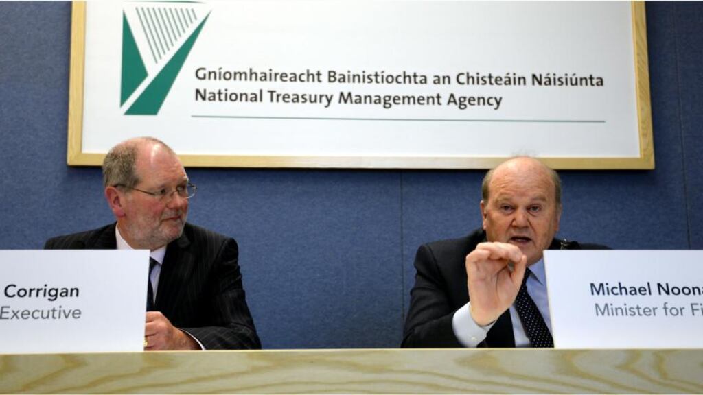 NTMA chief executive John Corrigan and Minister for Finance Michael Noonan at the launch of the NTMA’s Annual Report 2012. Photograph: Brenda Fitzsimons.